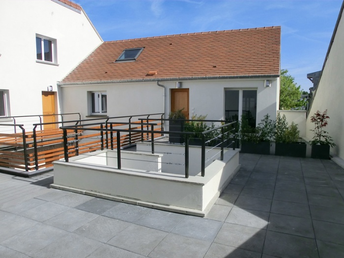 R�habilitation, extension et sur�l�vation d'un immeuble insalubre - Meaux : 01.Photo r�alis� 3