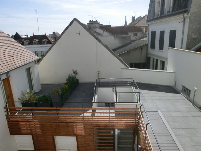 R�habilitation, extension et sur�l�vation d'un immeuble insalubre - Meaux : 01.Photo r�alis� 4